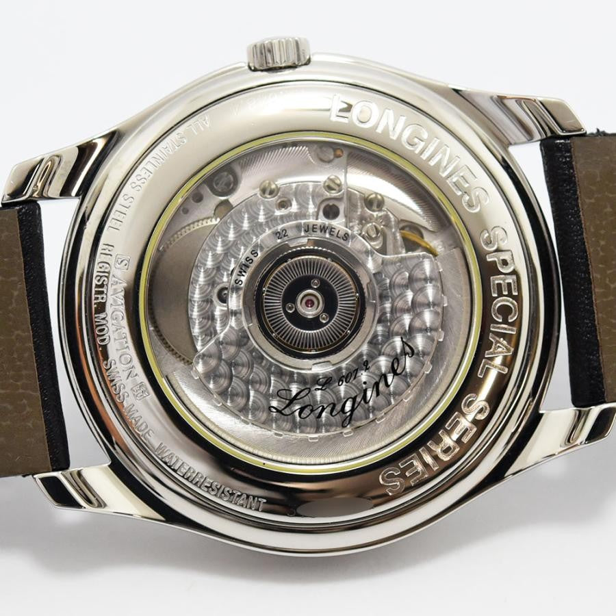 VINTAGE WATCHES FASHIONの自動巻きメンズウォッチ。ステンレススチールケース、ブラックレザーストラップ、スケルトンバック。スイス製。
