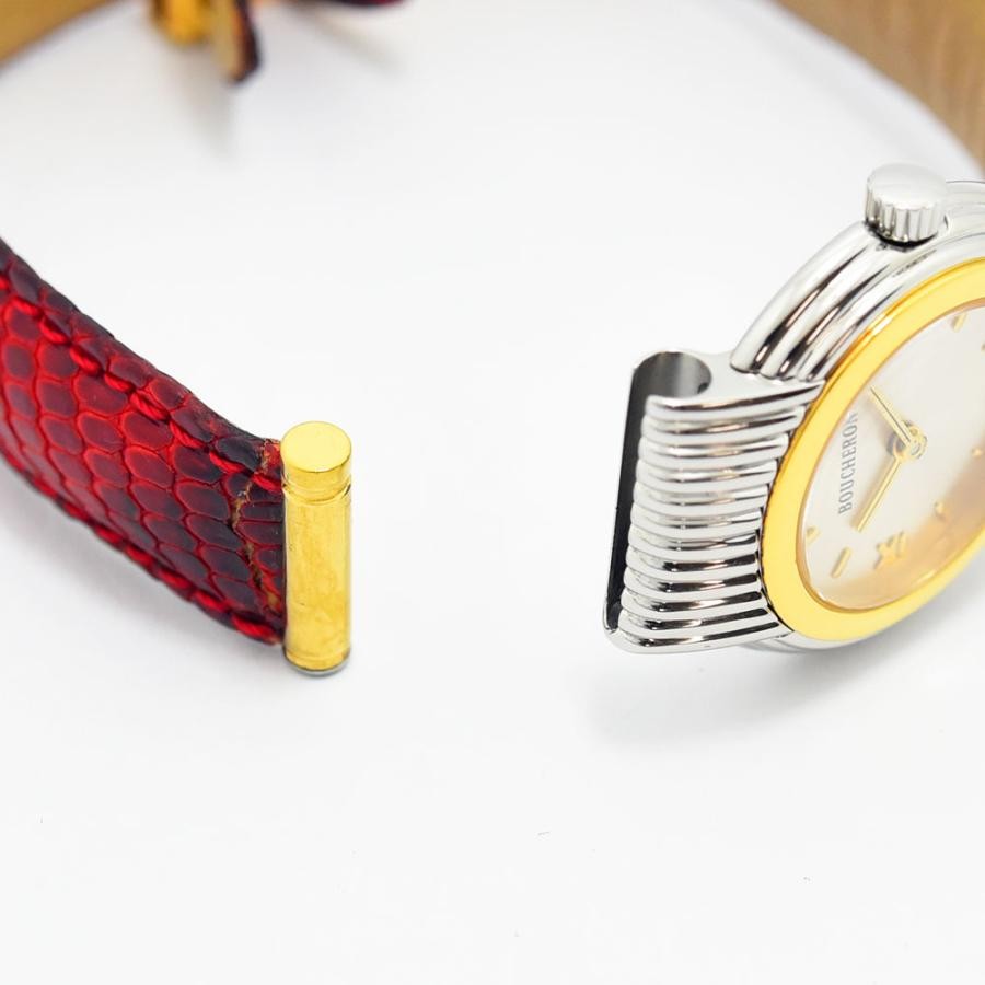 VINTAGE WATCHES FASHIONのブシュロン製ヴィンテージレディースウォッチ。シルバーとゴールドのコンビケースに鮮やかなレッドのエキゾチックレザーベルトを合わせたエレガントな腕時計。