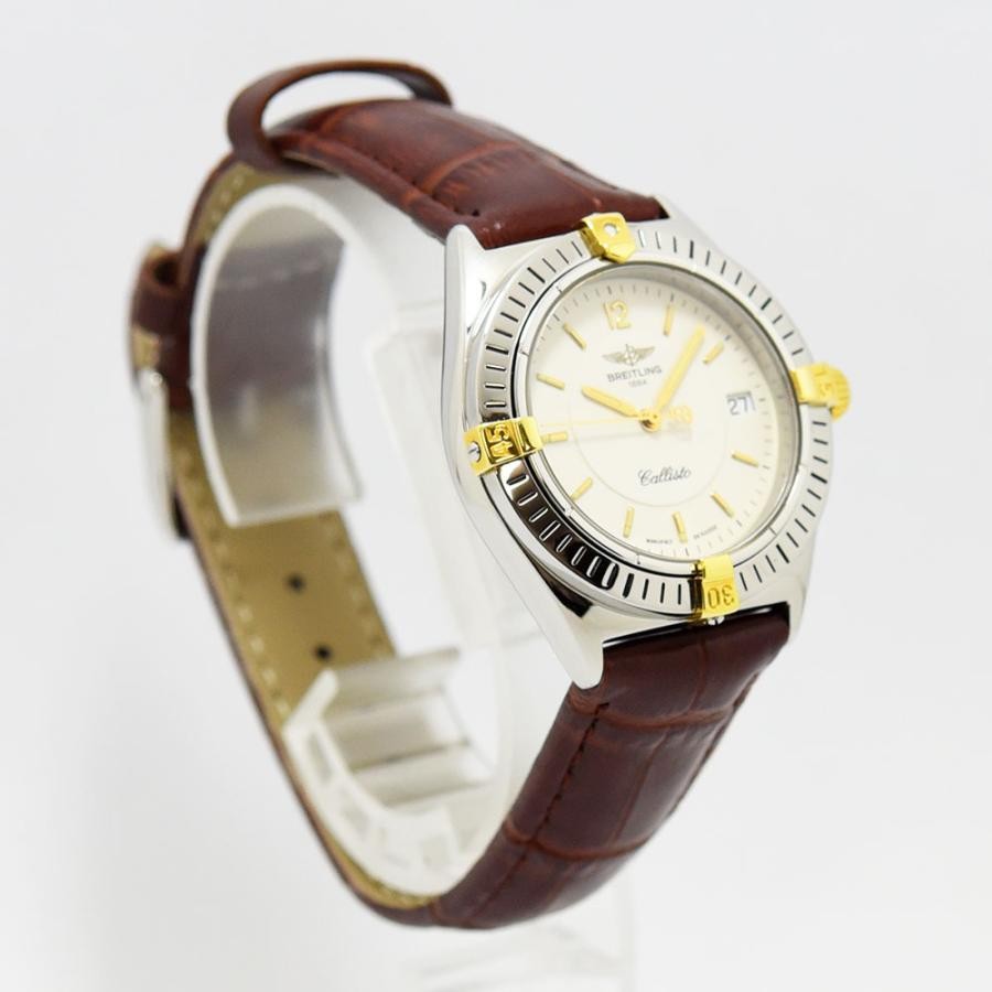 VINTAGE WATCHES FASHION Breitling Callisto レディースウォッチ。クリーム色の文字盤、ゴールドのインデックスと針、日付表示窓、ゴールドアクセントのベゼル、ブラウンのクロコダイル型押しレザーストラップ。