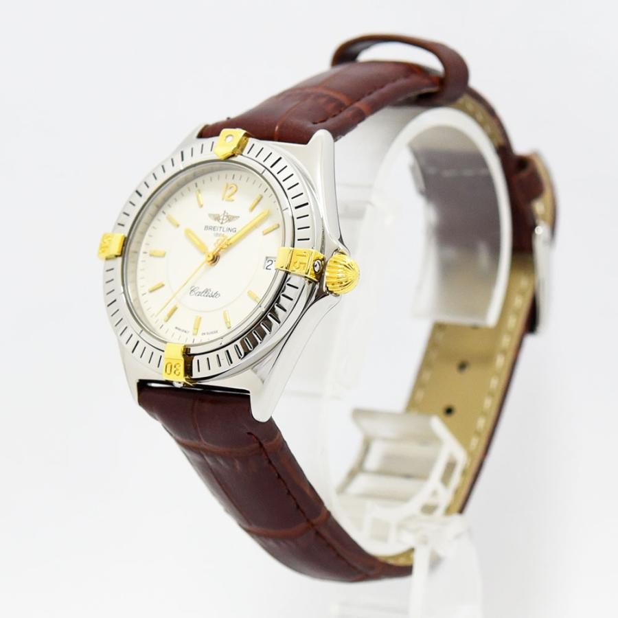 VINTAGE WATCHES FASHION Breitling Callisto レディースウォッチ。クリーム色の文字盤、ゴールドのインデックスと針、日付表示窓、ゴールドアクセントのベゼル。ブラウンのクロコダイル型押しレザーストラップ。