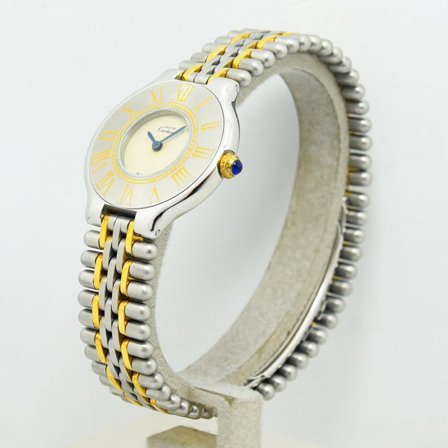 VINTAGE WATCHES FASHIONのカルティエ マストタンク。シルバーとゴールドのコンビネーション、ローマ数字インデックス、ブルーの針が特徴のクラシックな腕時計。