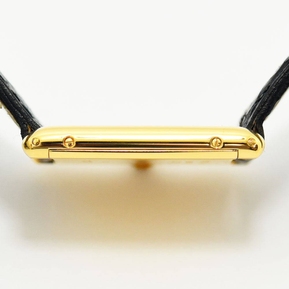 VINTAGE WATCHES FASHIONのCartier Tank Louis Cartier 18Kイエローゴールド製ケースの側面、ブラックレザーベルト付き