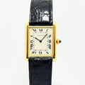 VINTAGE WATCHES FASHIONのCartier Tank Louis Cartier腕時計。18Kイエローゴールドのレクタンギュラーケースにブラックのアリゲーターレザーベルトを合わせたヴィンテージモデル。