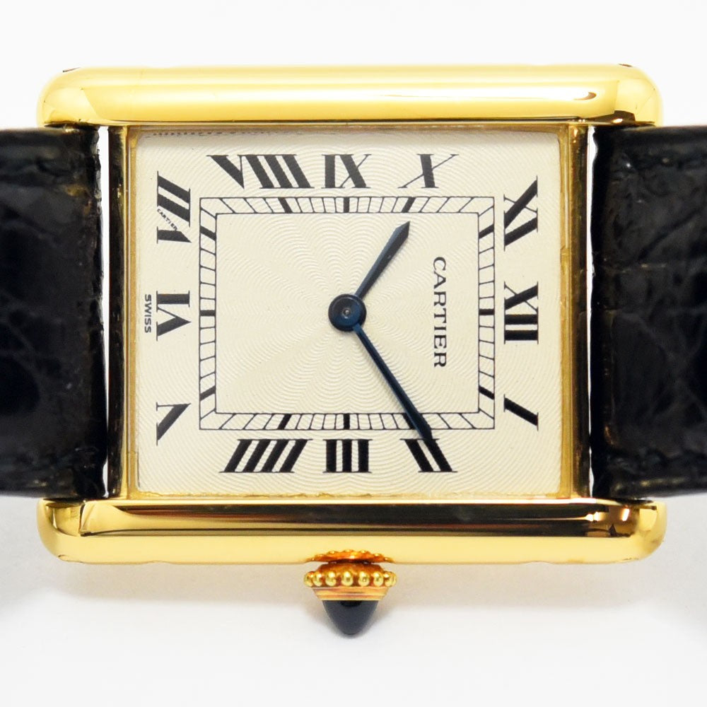VINTAGE WATCHES FASHIONのCartier Tank Louis Cartier腕時計。18Kイエローゴールドのレクタンギュラーケース、ホワイトダイアル、ローマ数字、ブルースチール針、ブラックのアリゲーターレザーベルト。