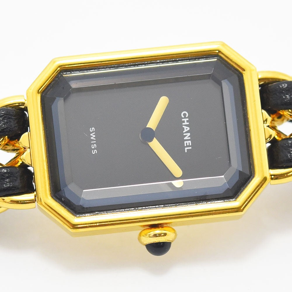 VINTAGE WATCHES FASHIONのシャネル プルミエールウォッチ。ゴールドトーンのケース、ブラックレザーを編み込んだチェーンブレスレット、ブラックの文字盤。