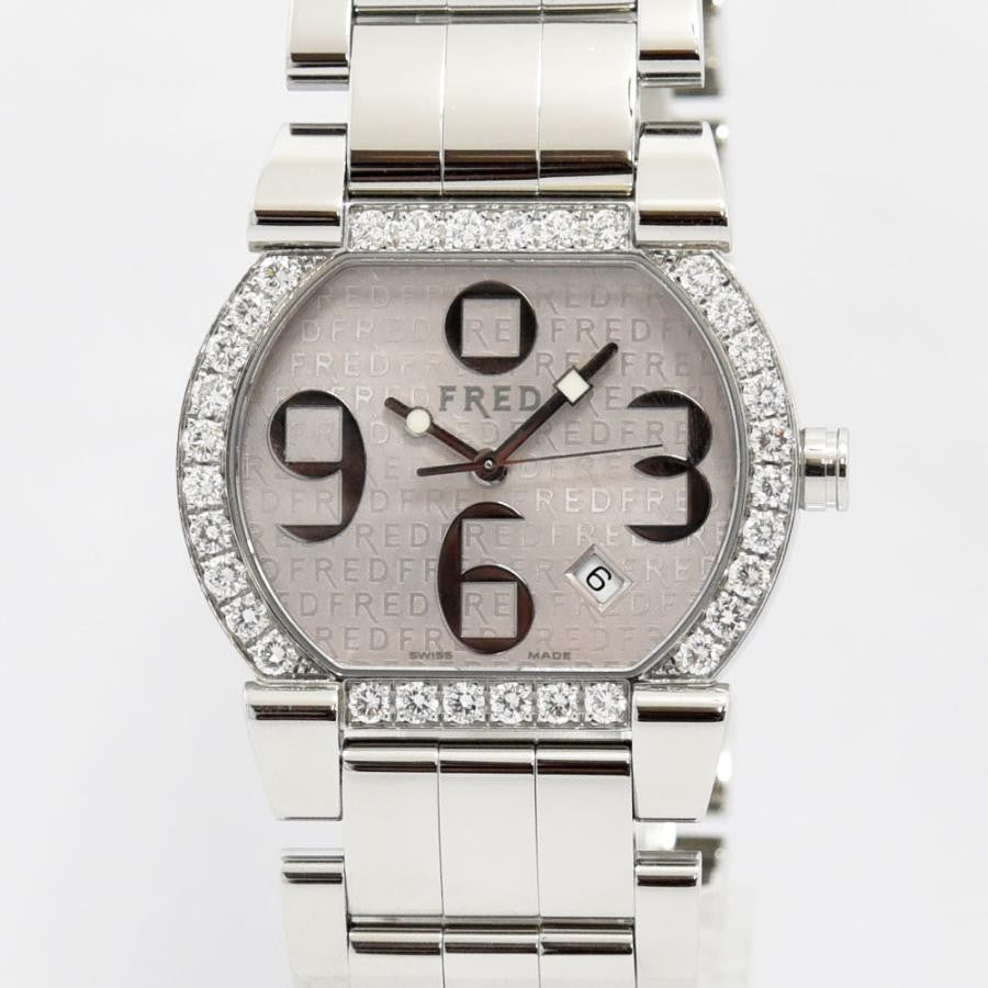 VINTAGE WATCHES FASHIONのダイヤモンドベゼルレディースウォッチ。シルバーカラーのステンレススチール製。アラビア数字インデックスと日付表示付き。