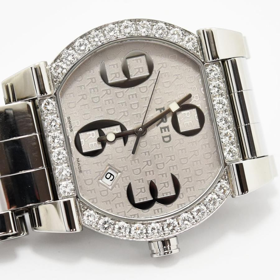 VINTAGE WATCHES FASHION レディースダイヤモンドベゼルウォッチ。シルバーカラーのステンレススチール製。ダイヤモンドがベゼルにあしらわれています。日付表示機能付き。