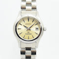 VINTAGE WATCHES FASHIONのグランドセイコーレディース腕時計。シルバーのステンレス製ケースとクリーム色の文字盤が特徴。