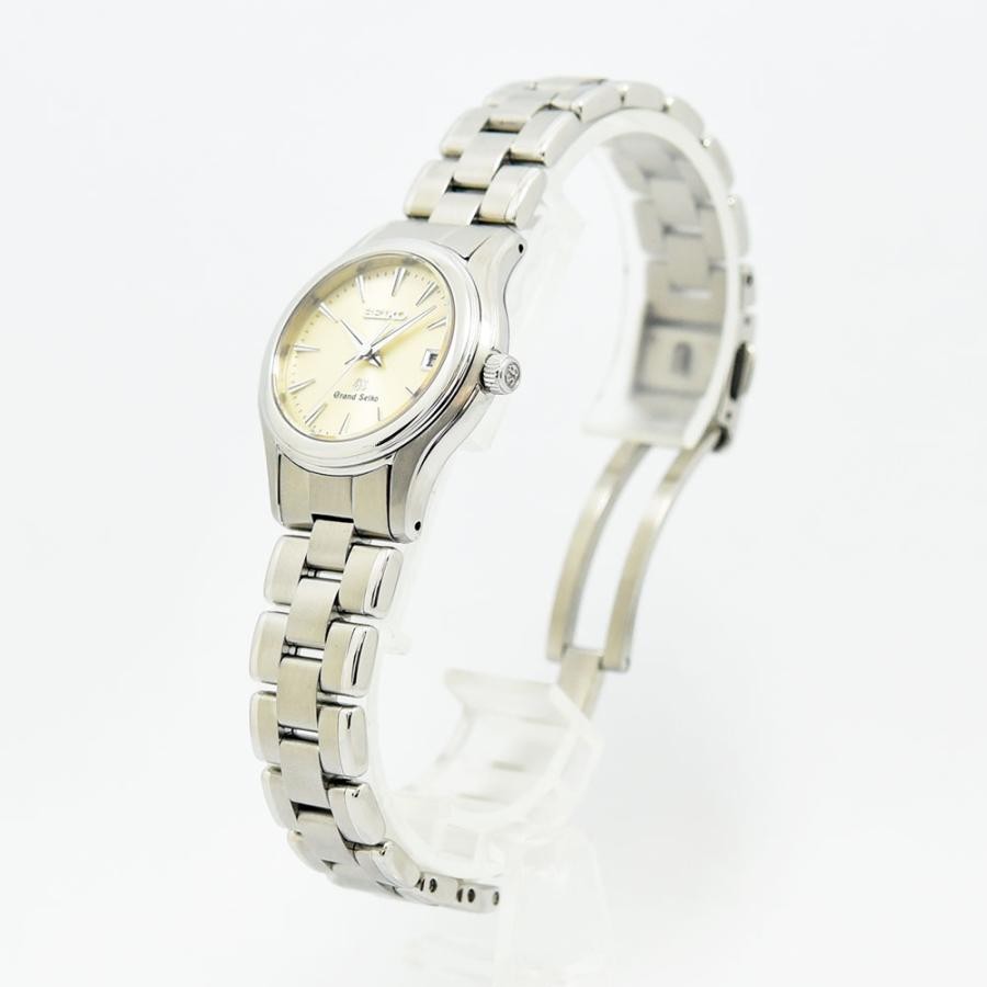 VINTAGE WATCHES FASHIONのグランドセイコーレディース腕時計。シルバーのステンレススチール製ブレスレットと上品なクリーム色の文字盤が特徴。