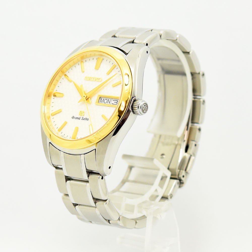 VINTAGE WATCHES FASHIONのシルバーとゴールドのステンレススチール製グランドセイコーメンズ腕時計、デイデイト表示付き