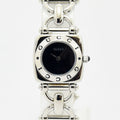 VINTAGE WATCHES FASHIONのGUCCI 6400Lレディース腕時計。シルバーのステンレススチール製で、ロゴ入りベゼルとブラック文字盤が特徴的。