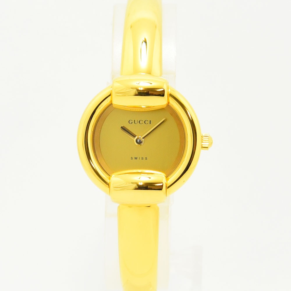 VINTAGE WATCHES FASHIONのGUCCI 1400Lレディースバングルウォッチ。高級感のあるゴールドカラーのステンレス製腕時計。