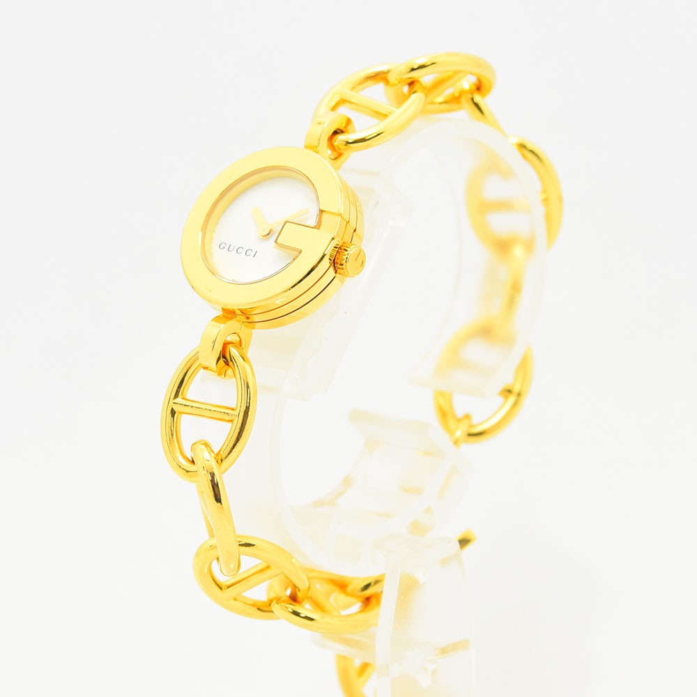 VINTAGE WATCHES FASHIONのゴールドチェーンブレスレットが特徴的なGUCCIのレディース腕時計。ホワイト文字盤にGモチーフが施されたエレガントなデザイン