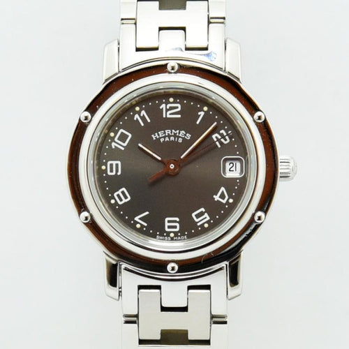 VINTAGE WATCHES FASHION エルメス クリッパー クオーツ レディース腕時計。ダークグレー文字盤、アラビア数字インデックス、日付表示、ブラウンベゼル、ステンレススチールブレスレット。