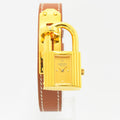 VINTAGE WATCHES FASHIONのHERMESケリーウォッチ。ゴールドの南京錠型ケースとホワイトステッチ入りブラウンレザーベルトが特徴のレディース腕時計。