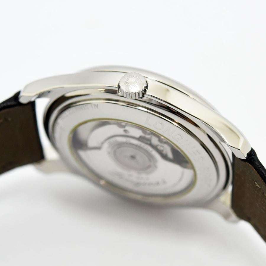 VINTAGE WATCHES FASHIONのクラシックな自動巻きメンズウォッチ。ステンレススチールケース、ブラックレザーベルト。日付表示窓付き。