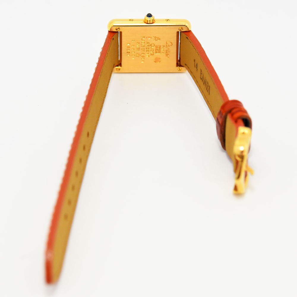 VINTAGE WATCHES FASHIONのMust de Cartier Tankウォッチ、オレンジのアリゲーターレザーストラップ、ゴールドトーンケース、クリーム色の文字盤