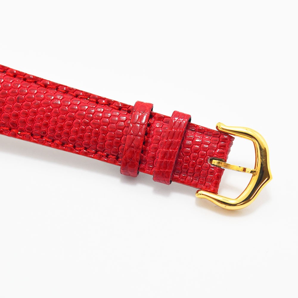 VINTAGE WATCHES FASHION Must de Cartier Tank Watchの鮮やかなレッドレザーベルト。ゴールドのバックル付き。