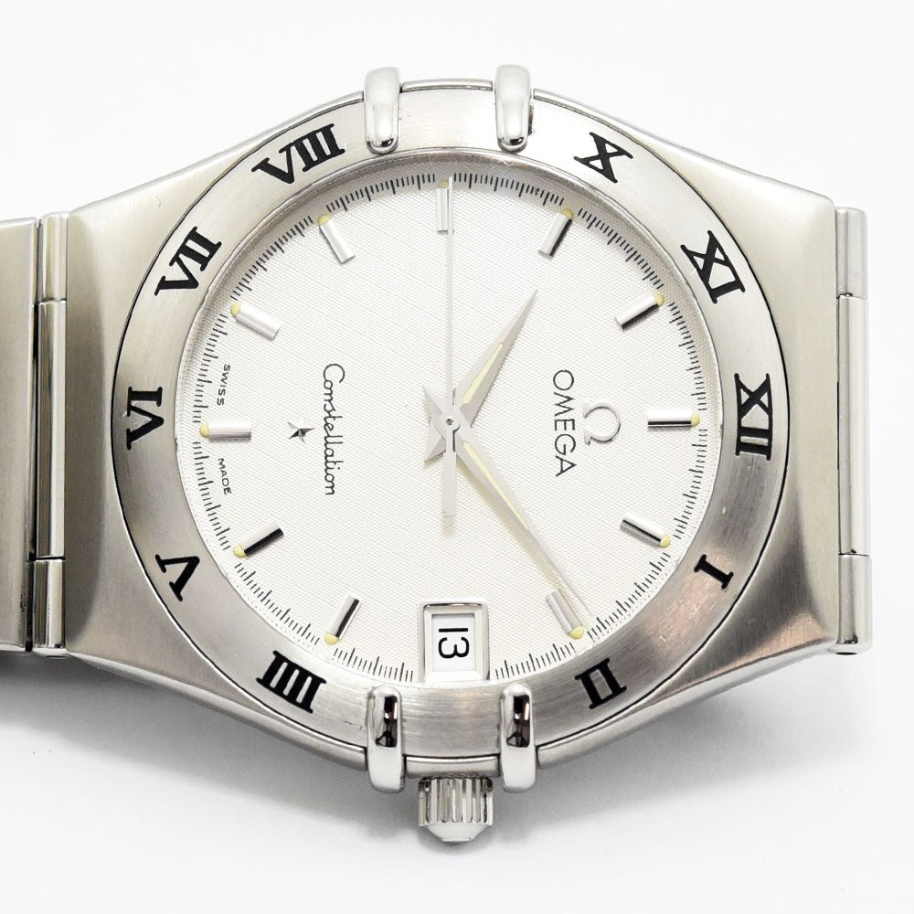 VINTAGE WATCHES FASHIONのオメガ コンステレーション。シルバーのステンレス製ケースとローマ数字インデックスが特徴的な腕時計。