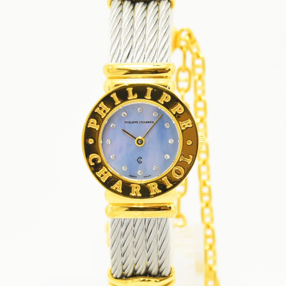 VINTAGE WATCHES FASHIONのフィリップ・シャリオール製レディース腕時計。ゴールドベゼルとワイヤーケーブルブレスレット、ストーン付きマザーオブパール文字盤が特徴。