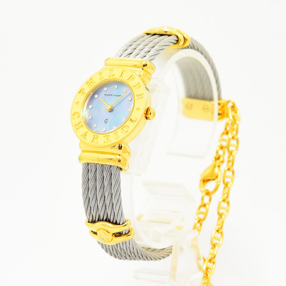 VINTAGE WATCHES FASHIONのフィリップ・シャリオール製レディース腕時計。ゴールドベゼルとワイヤーケーブルブレスレット、マザーオブパール文字盤が特徴。